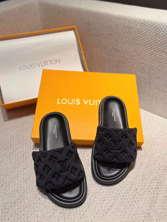 Black slippers and shoes